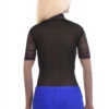All-over lace bodysuit with thong cut over sheer mesh, holding a clean line under fitted clothing.