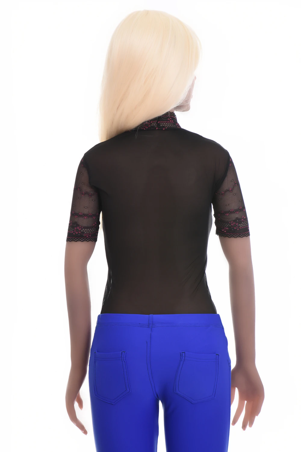 All-over lace bodysuit with thong cut over sheer mesh, holding a clean line under fitted clothing.