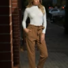 Breathable cotton bodysuit with long sleeves and hook-and-eye closure, covered at the neck and arms.