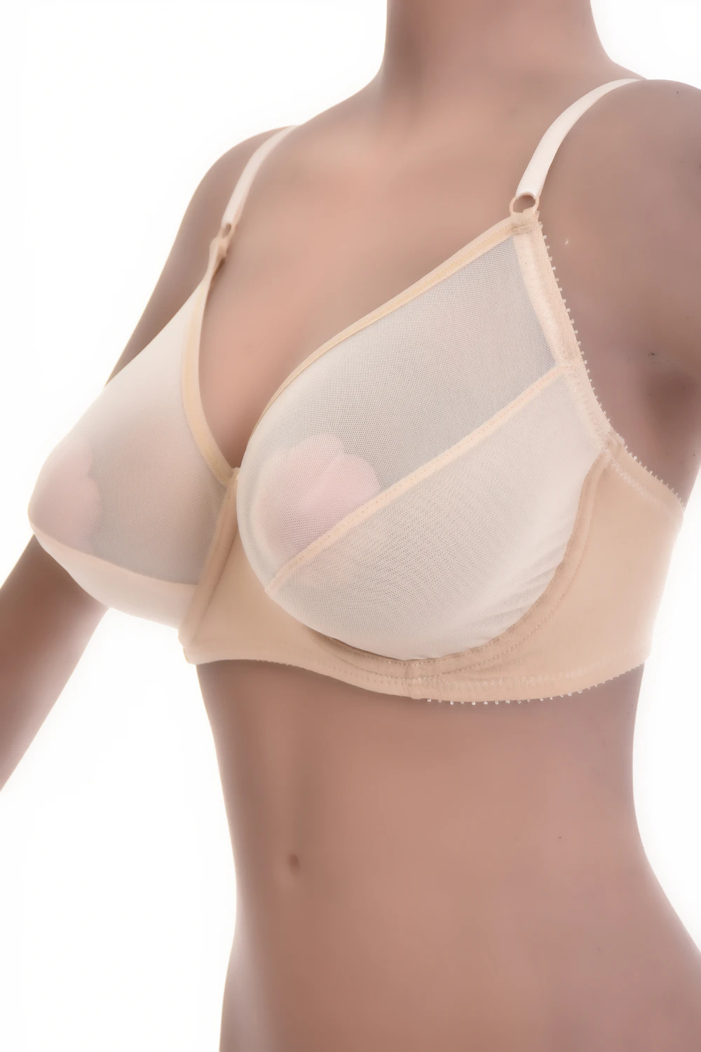 Breathable unpadded cotton bra with soft cups and a sheer mesh edge, natural and light for everyday wear.