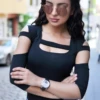 Breathable long-sleeve cotton bodysuit with hook-and-eye closure and a clean thong line.