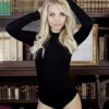 Breathable mock-neck cotton bodysuit with long sleeves and hook-and-eye closure, a cosy everyday base.