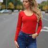 Breathable scoop-neck cotton bodysuit by Tiara Galiano with hook-and-eye gusset closure.