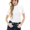 Cotton-blend bodysuit with bikini cut, close polo shape worn under a jacket or as a tidy top.
