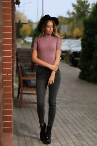 Cotton bodysuit with a neat mock neck and bikini cut, breathable and soft for everyday layering.