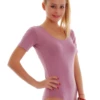 Cotton tee bodysuit with scoop neck, tucked clean with a hook-and-eye gusset and no bunching.