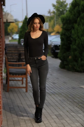 Warm knitted wool-blend bodysuit with bikini coverage and long sleeves, a lightweight winter base.