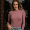 Long-sleeve cotton-blend bodysuit with bikini coverage, breathable and close for a smooth line.