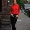 Long-sleeve cotton-blend bodysuit with thong back, breathable and close for a smooth line under clothing.