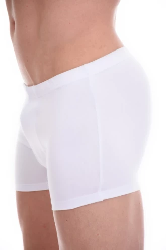 Breathable cotton men's boxer briefs cut to sit smoothly under slim pants without bunching.