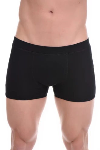 Men's cotton boxer briefs cut to hold close and prevent riding up under slim pants.