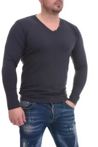 Breathable cotton men's long-sleeve V-neck tee worn smoothly under an open-collar shirt.