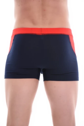 Close-fitting cotton men's underwear with an extended boxer leg for coverage under trousers.
