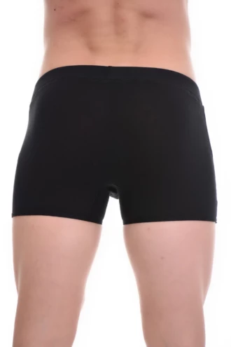 Close-fitting cotton men's underwear with a longer boxer leg for smooth coverage under trousers.