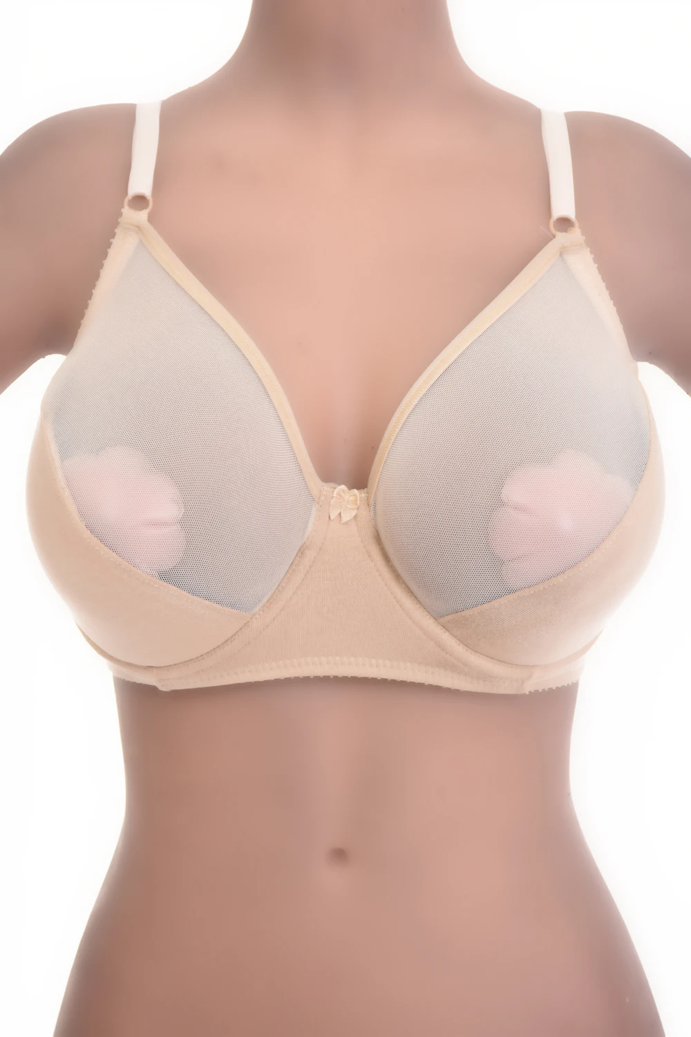 Soft-cup bra blending microfiber and sheer mesh, unpadded for a natural shape with a clean line under clothing.