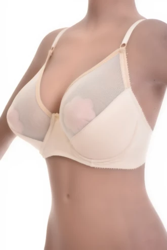 Soft-cup bra blending microfiber and sheer mesh panels, unpadded for a natural shape with a clean line.