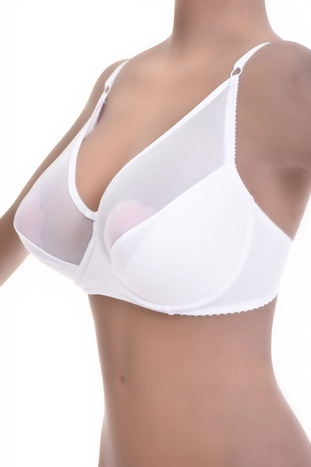 Microfiber and mesh soft-cup bra with unpadded cups and sheer mesh panels, keeping a clean line under tops.