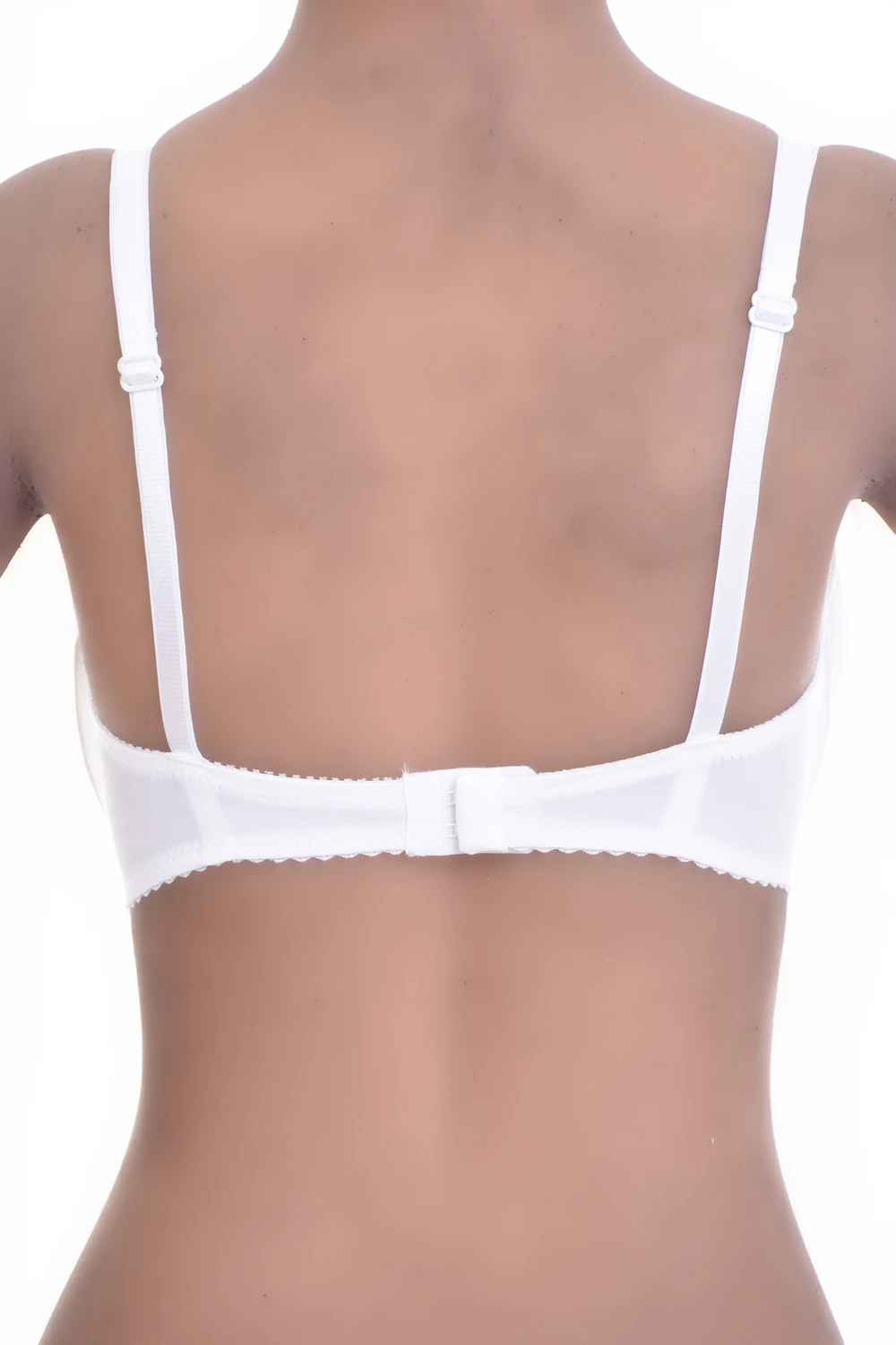 Soft-cup microfiber bra with no padding for a natural shape and a back hook-and-eye closure, with mesh panels.
