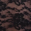 Mock-neck black lace bodysuit with short sleeves and thong back, a delicate close-fitting occasion piece.