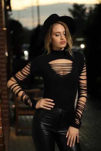 Mock-neck cotton bodysuit with hook-and-eye closure and thong cut, a reliable cool-weather base layer.