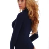 Mock-neck cotton bodysuit by Tiara Galiano, covered at neck and arms, easy under knitwear or a blazer.