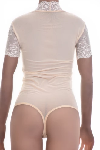 Mock-neck lace bodysuit over sheer mesh with hook-and-eye closure, a lighter covered lace style.
