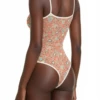 Paisley-print mesh bodysuit with scoop neck, spaghetti straps and thong cut in terracotta and rust tones.