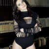 Polo-style long-sleeve cotton bodysuit with thong back, breathable and close for everyday cool-weather wear.