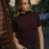 Polo-style cotton bodysuit with mock neck and thong back, soft and close for everyday transitional wear.