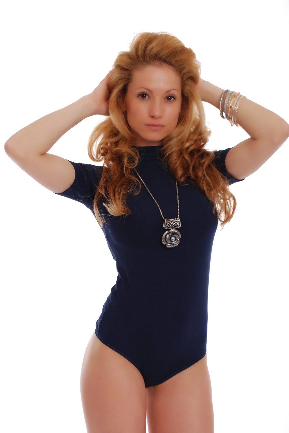 Polo-style cotton bodysuit with mock neck and thong back, soft and close for everyday transitional wear.