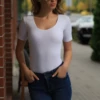 Tiara Galiano cotton bodysuit with scoop neck and short sleeves, a soft dependable daily layer.