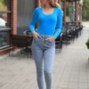 Tiara Galiano cotton shirt bodysuit with scoop neck, breathable and relaxed for everyday layering.