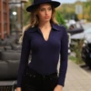 Tiara Galiano cotton shirt bodysuit with V-neck and brazilian cut, worn with tailored trousers or denim.