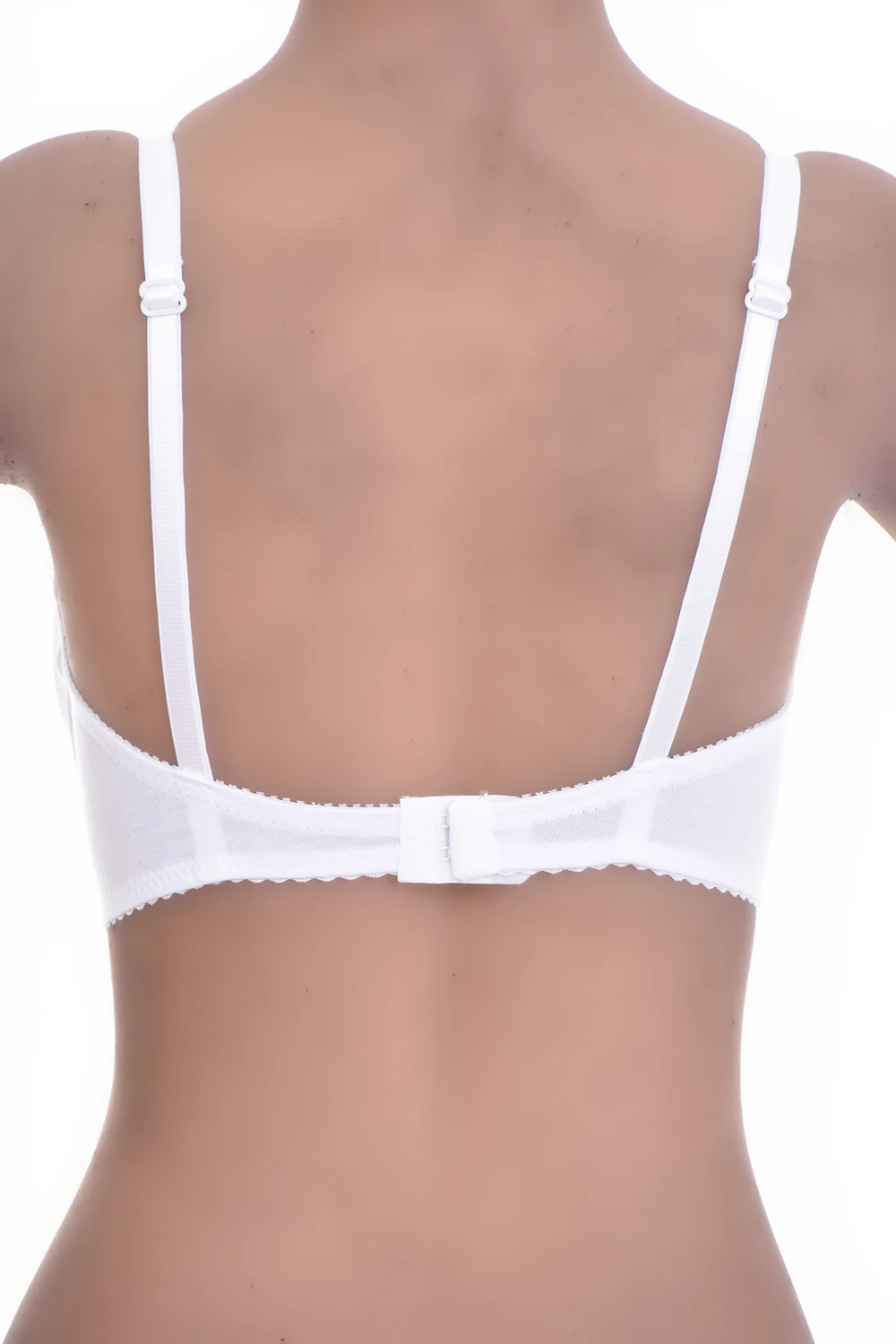 Unpadded cotton soft-cup bra with a sheer mesh trim and adjustable straps, soft and breathable against the skin.