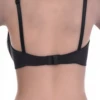 Unpadded microfiber bra with sheer mesh panels and a smooth finish, sitting flat under fitted tops all day.