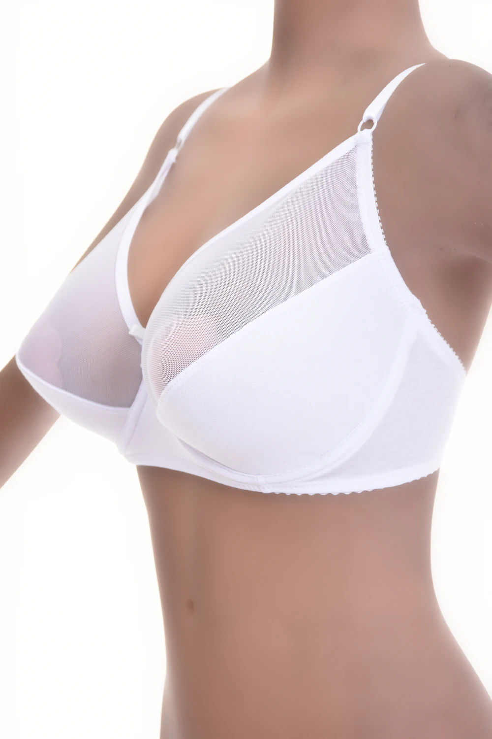 Unpadded soft-cup bra in smooth microfiber with a sheer see-through mesh detail along the edges of the cups.