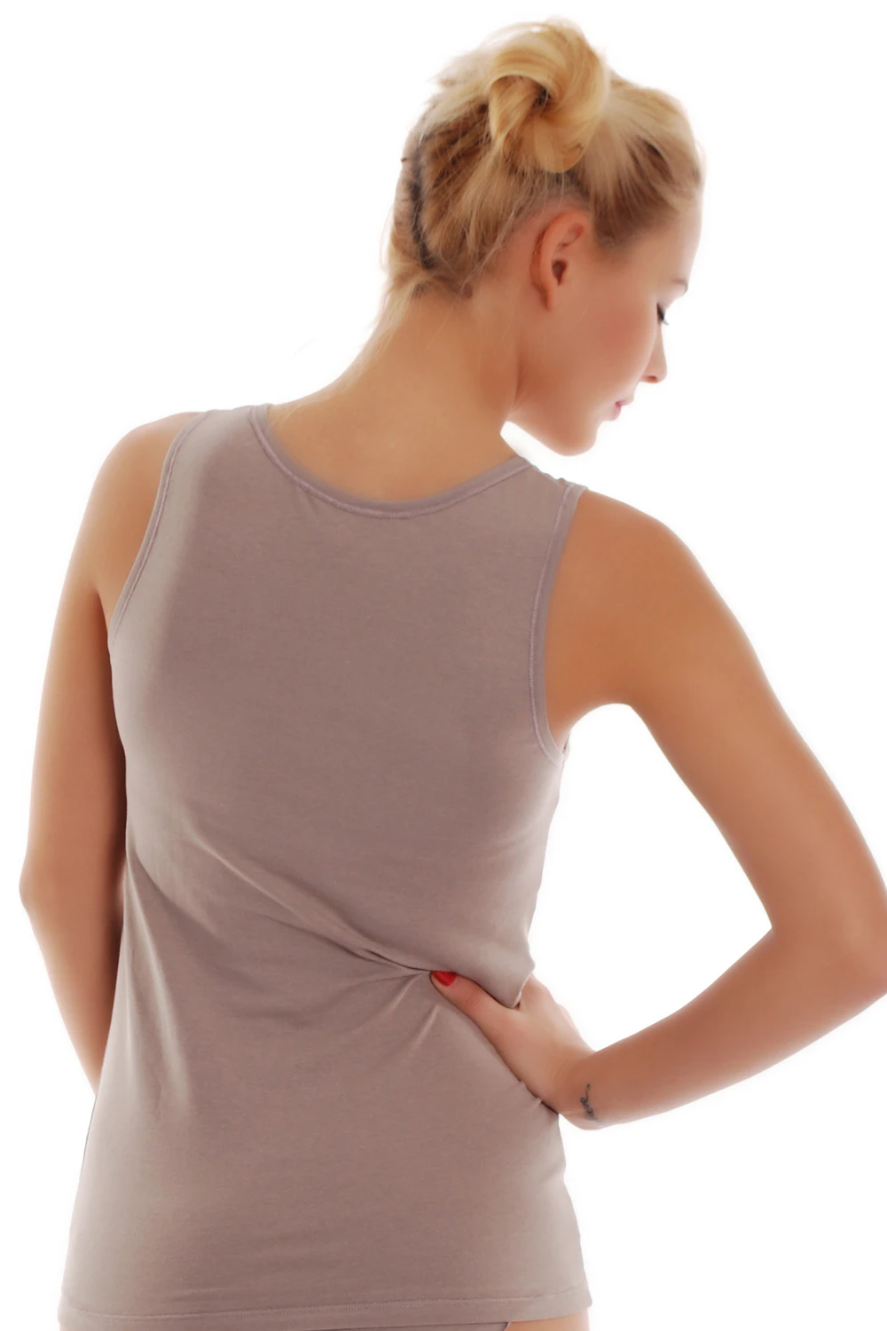 Breathable cotton tank with wide straps and a low scoop, a reliable everyday staple with an easy pull-on shape.