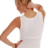 Women's cotton tank with wide straps and a scoop neck, soft and slim for layering under a cardigan.