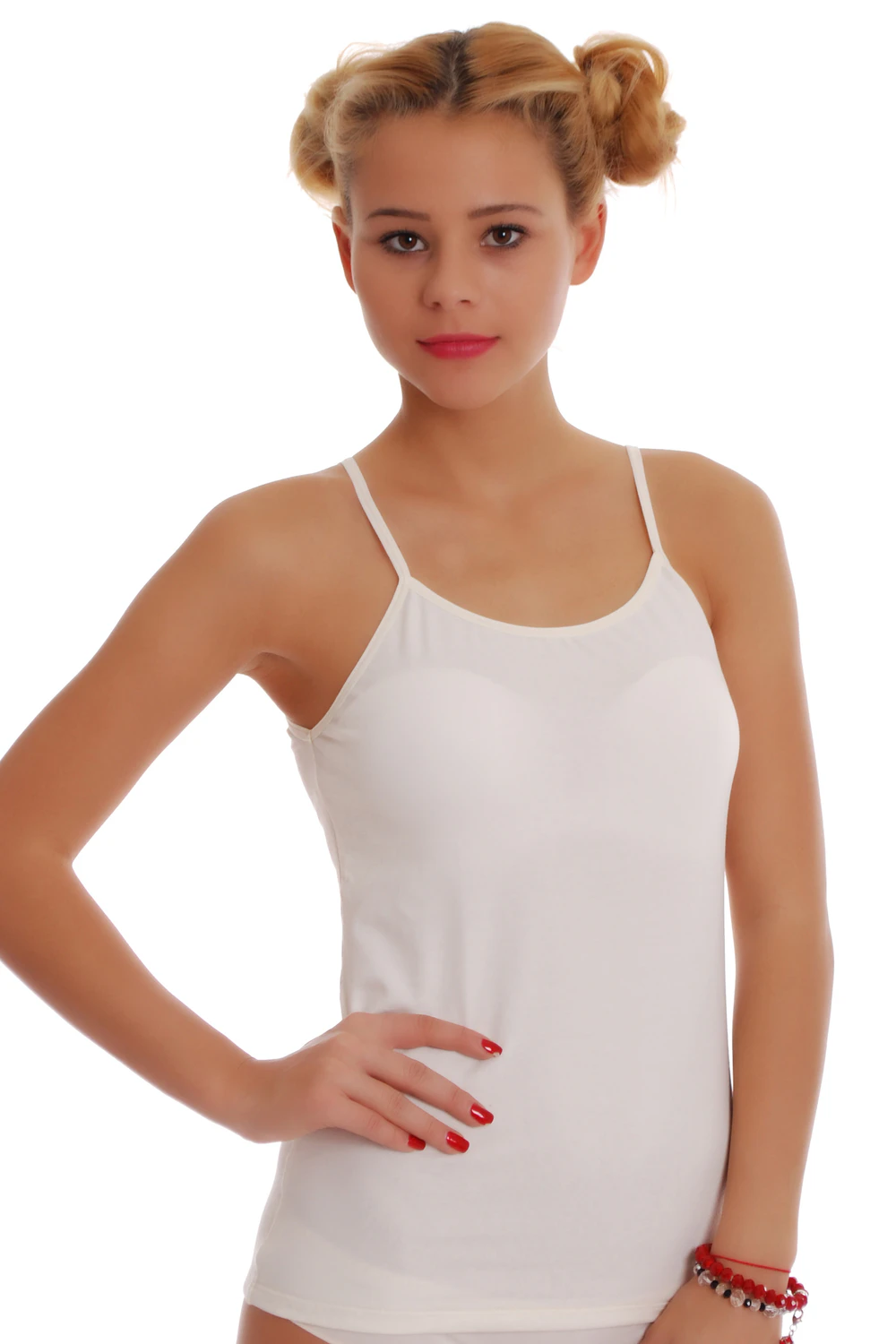 Delicate cotton camisole with fine straps and a scoop neck, a soft close everyday layer that follows the figure.