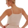 Slim cotton camisole with a low scoop and fine straps, soft and light on its own or as a fine base layer.