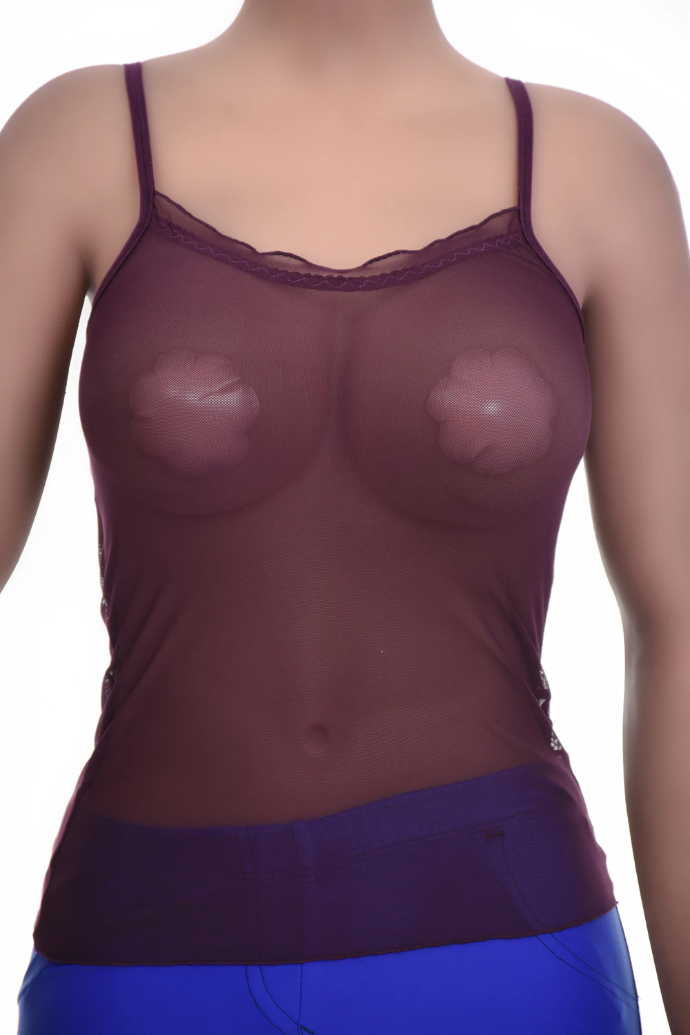 Textured mesh camisole with a scoop neck and delicate straps, airy and light to wear over a bralette in warm weather.