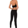Black women's wool leggings, full-length back view in a warm cozy knitted wool blend fabric