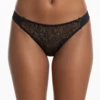 Black mesh Brazilian panties with a floral lace front panel and satin sides, moderate coverage.