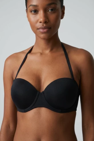 Black microfiber push-up bra with molded cups and angled padding that lifts up and in, smooth under fitted tops.