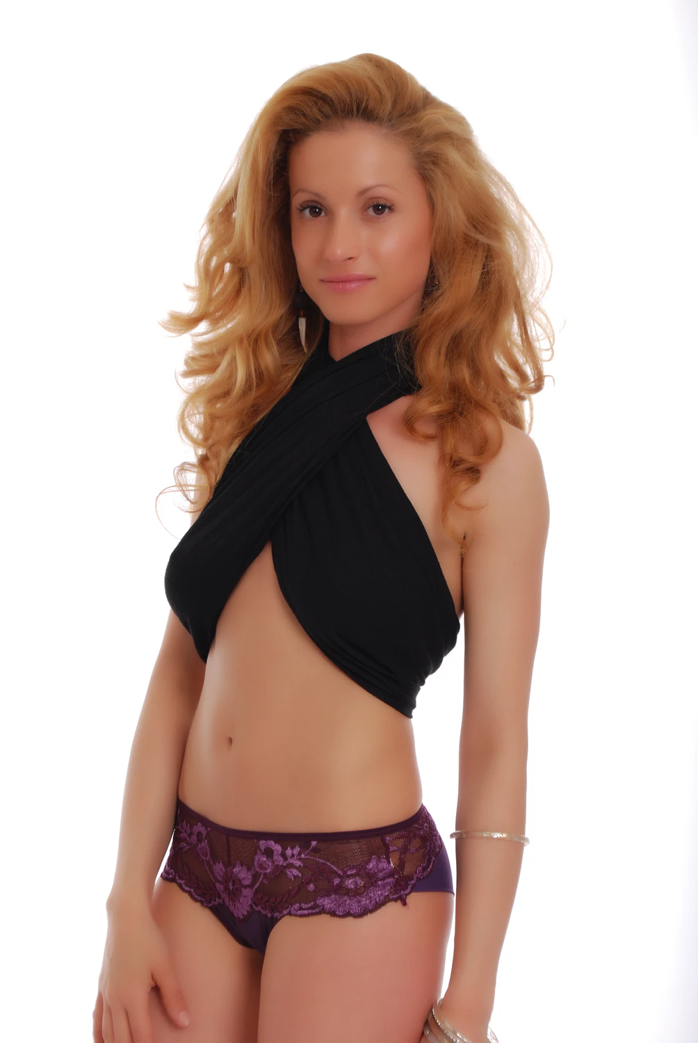 Cheeky mesh and lace Brazilian panties from Tiara Galiano with a decorative floral front.