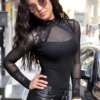 Cotton-blend bodysuit with decorative lace trim and thong back, a polo-style layer with a little richness.