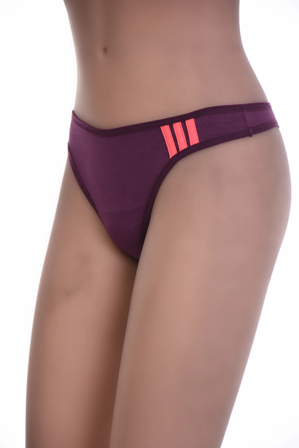 Cotton thong with a thong back and clean solid line, a quiet breathable everyday underwear staple.