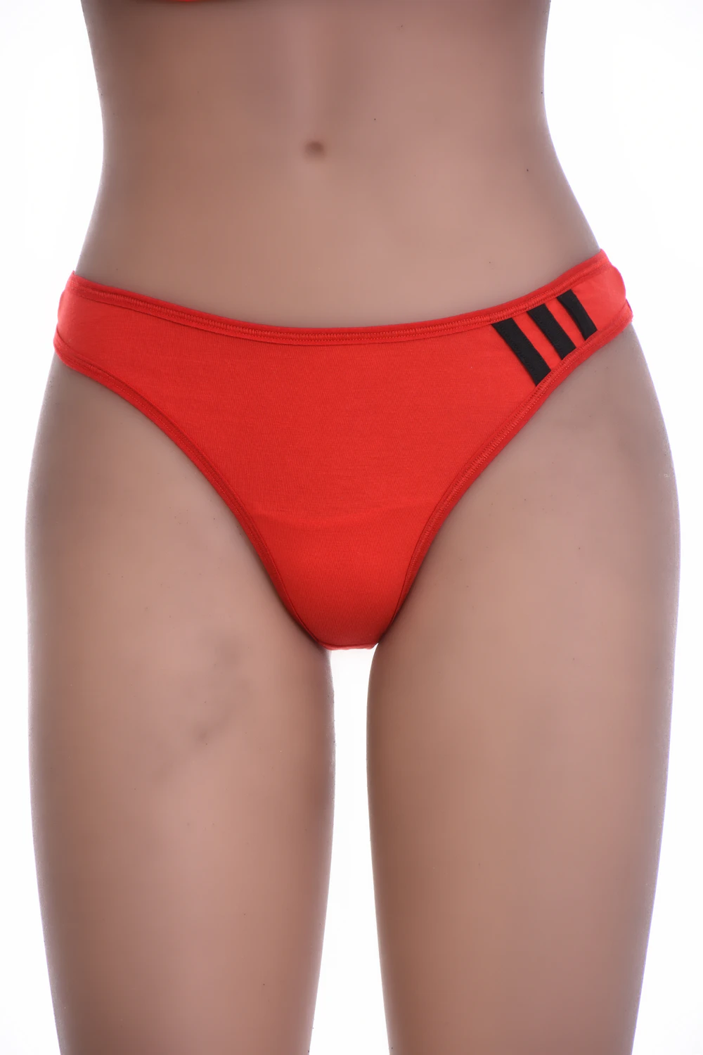 Soft cotton thong with a clean solid face and minimal back, a breathable everyday low-rise staple.