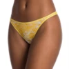 Floral-print mesh bikini briefs by Tiara Galiano in sheer mesh with a yellow-and-white floral pattern.