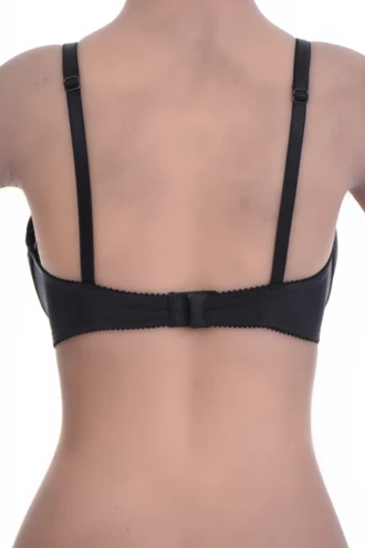 Soft unpadded lace bra with a small center bow and a microfiber band that keeps the base smooth and steady.